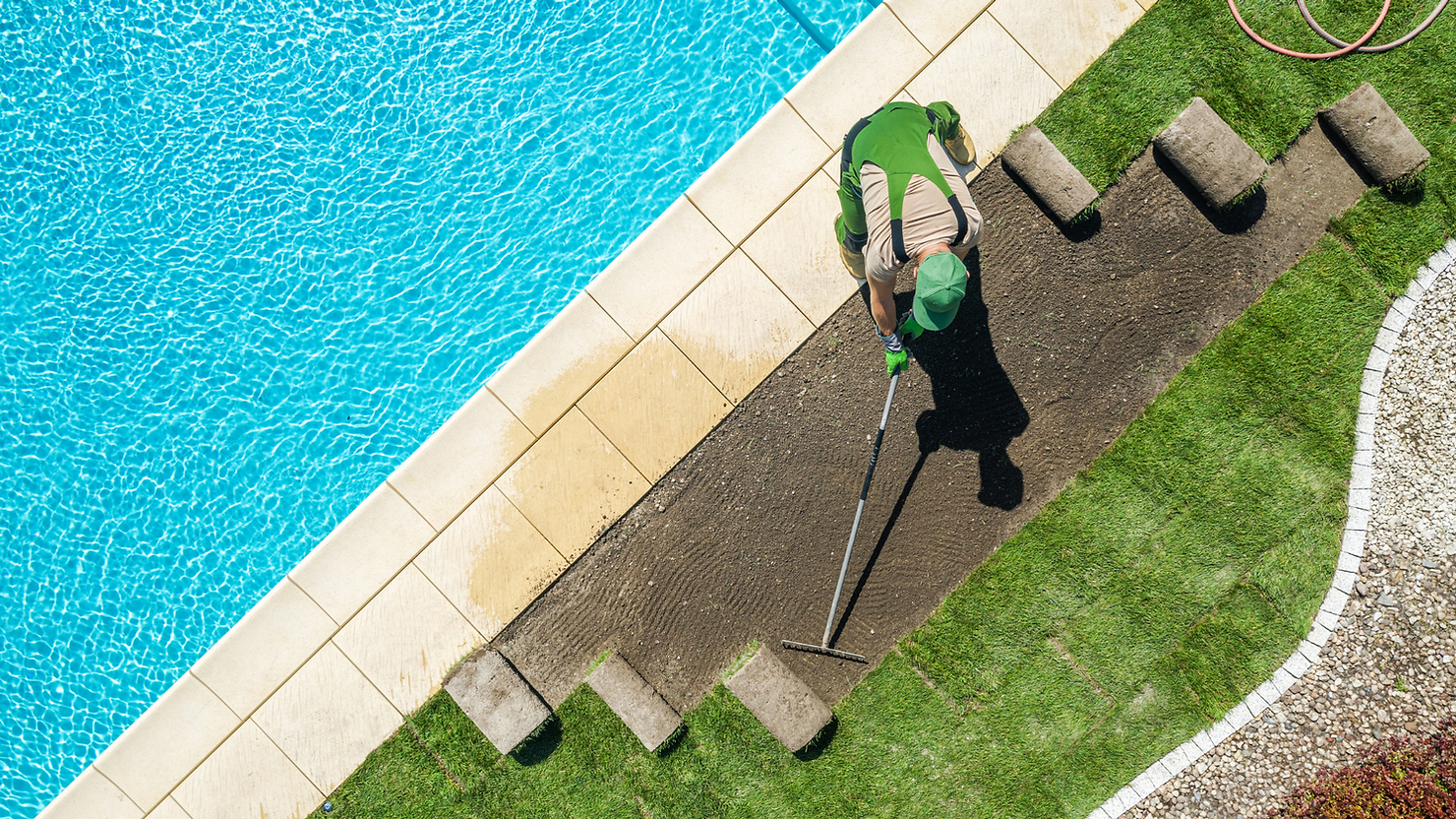 Landscaper installing grass